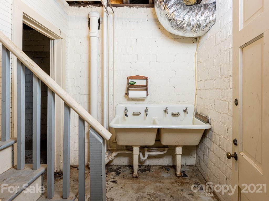 11 Hilltop Road Asheville, NC 28803 - Photo 36 of 42 a dining room with furniture and wooden floor