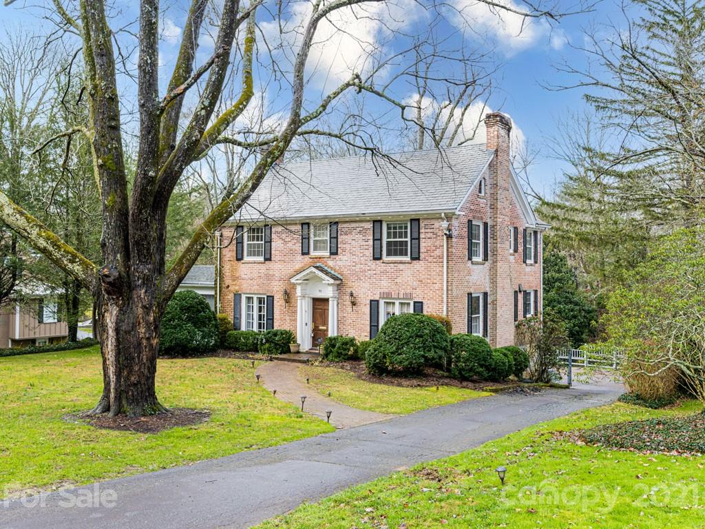 11 Hilltop Road Asheville, NC 28803 - Photo 42 of 42 a front view of a house with yard and green space