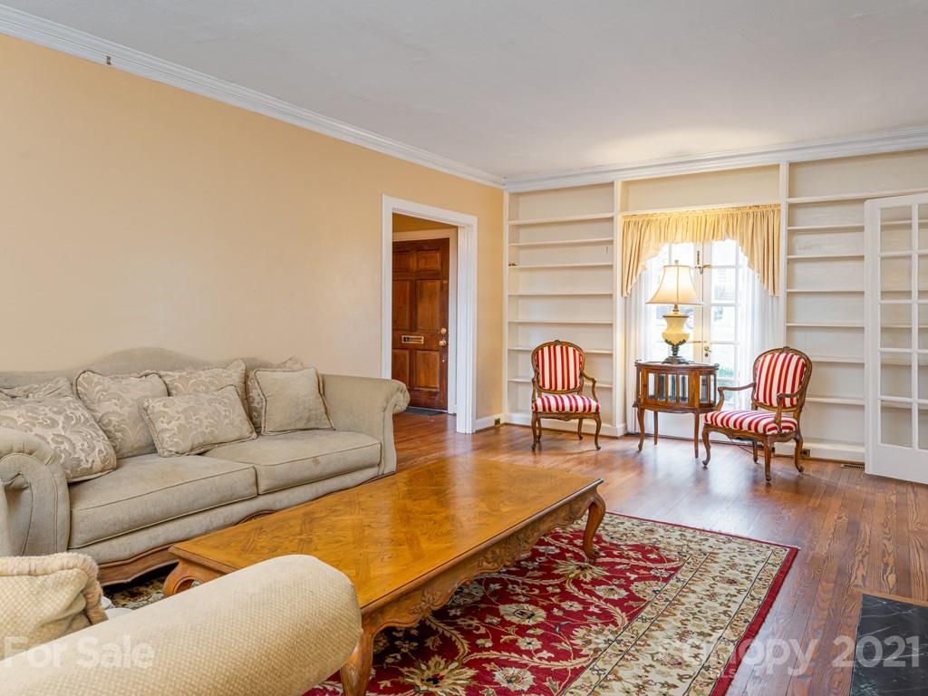 11 Hilltop Road Asheville, NC 28803 - Photo 10 of 42 a living room with furniture and a rug