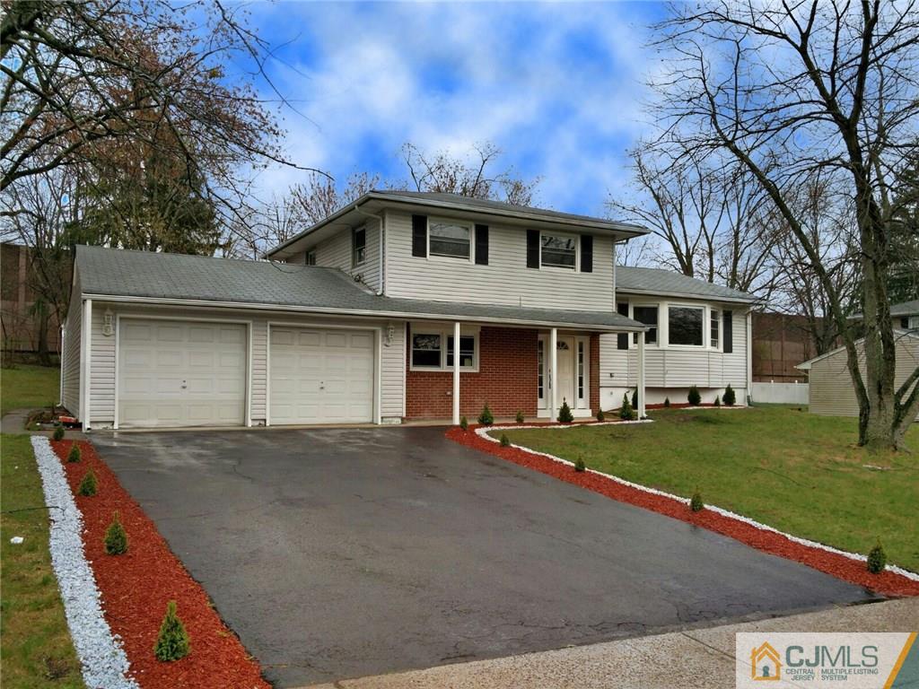 10 Jean Road East Brunswick, NJ 08816 - Photo 1 of 21 front view of a house with a yard