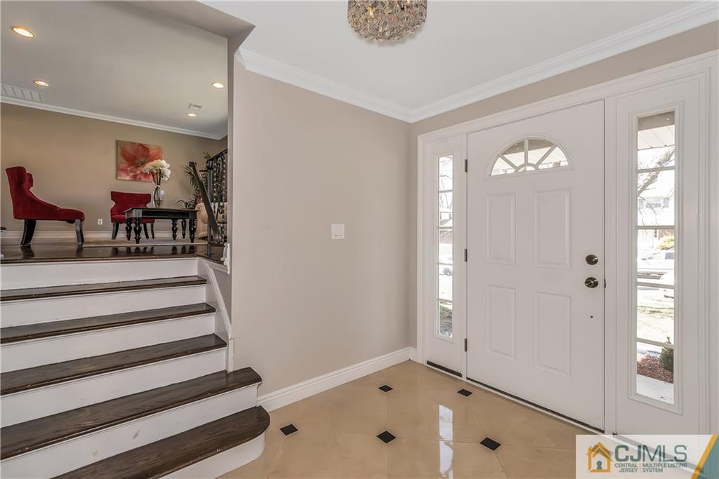 10 Jean Road East Brunswick, NJ 08816 - Photo 2 of 21 a view of a hallway with entryway