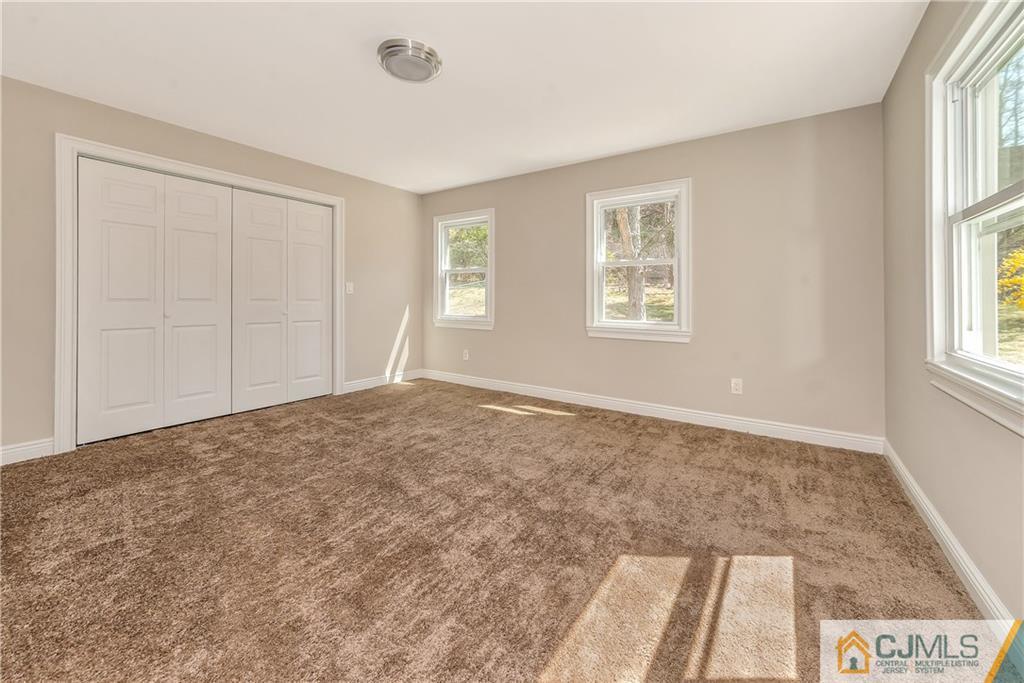 10 Jean Road East Brunswick, NJ 08816 - Photo 18 of 21 a big room with windows and closet