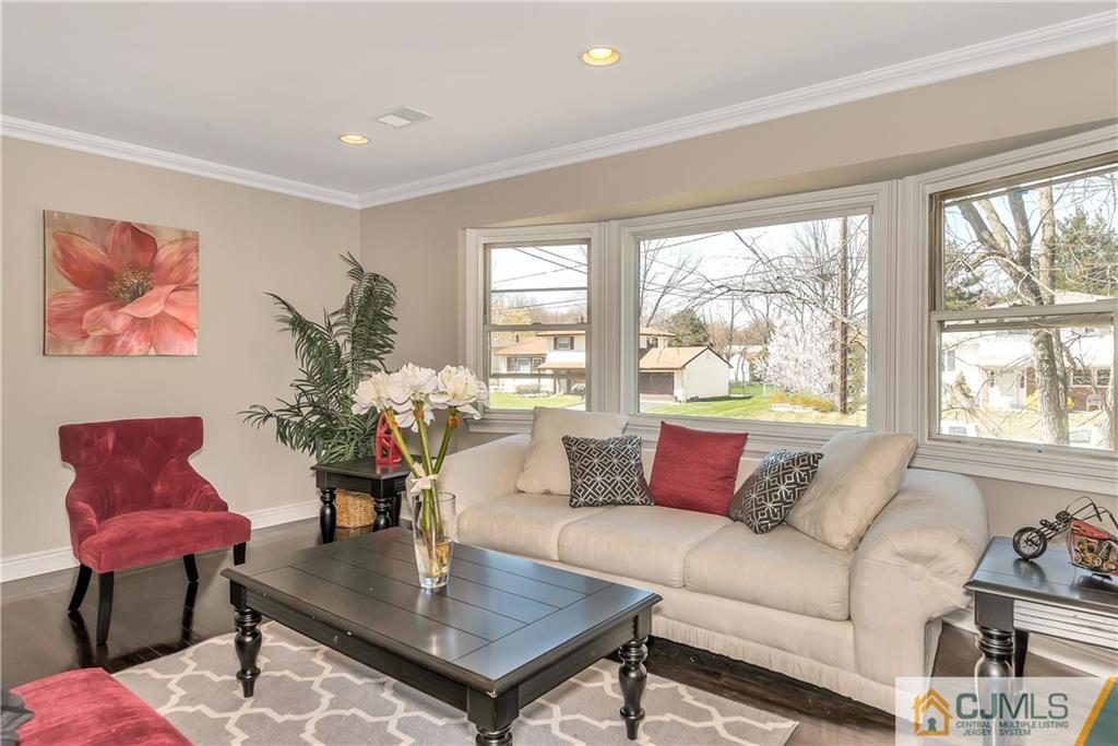 10 Jean Road East Brunswick, NJ 08816 - Photo 4 of 21 a living room with furniture plant and a large window