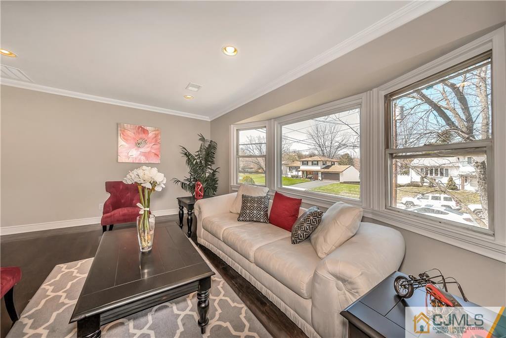 10 Jean Road East Brunswick, NJ 08816 - Photo 5 of 21 a living room with furniture and a large window