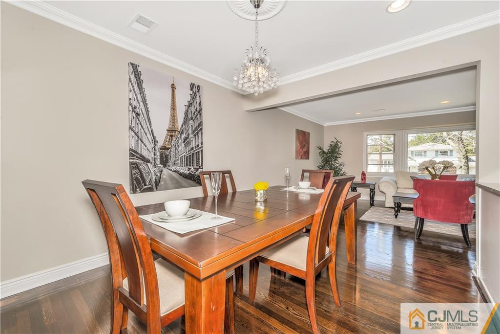 10 Jean Road East Brunswick, NJ 08816 - Photo 6 of 21 a view of a dining room with furniture window and wooden floor