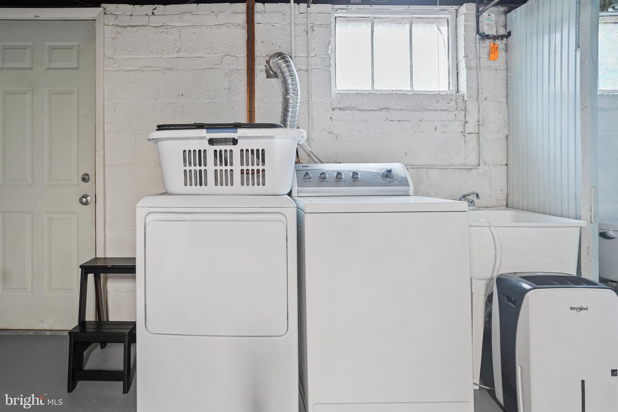 8907 Flower Avenue Silver Spring, MD 20901 - Photo 15 of 20 a utility room with dryer and washer