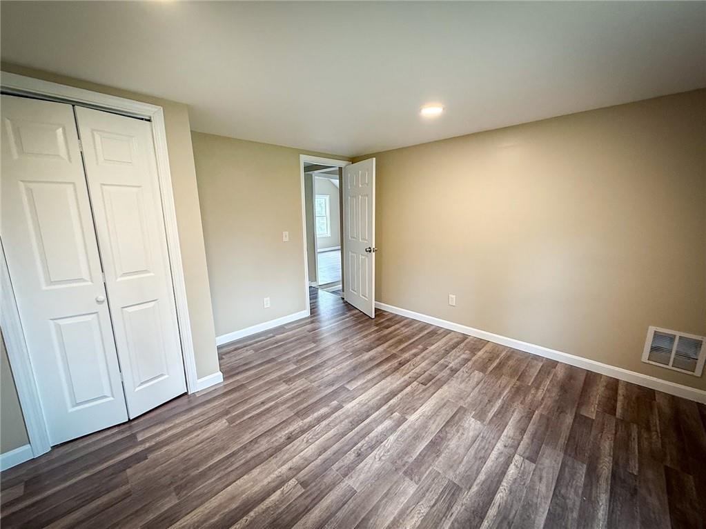 416 Oneida Valley Road Butler, PA 16001 - Photo 11 of 40 a view of an empty room with wooden floor