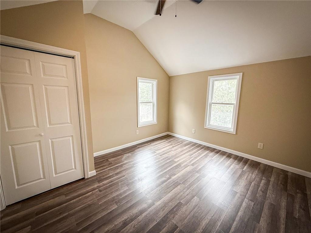 416 Oneida Valley Road Butler, PA 16001 - Photo 12 of 40 an empty room with wooden floor and windows