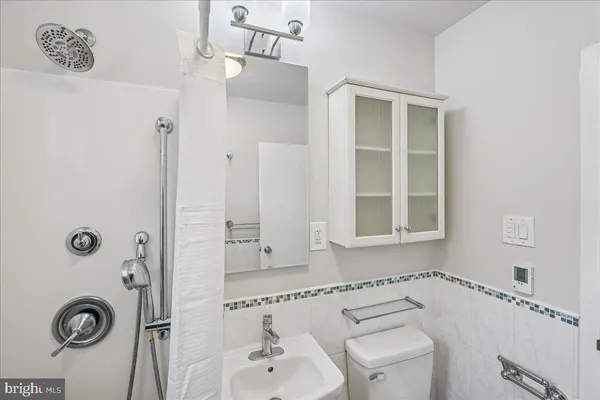 a bathroom with a sink and a toilet