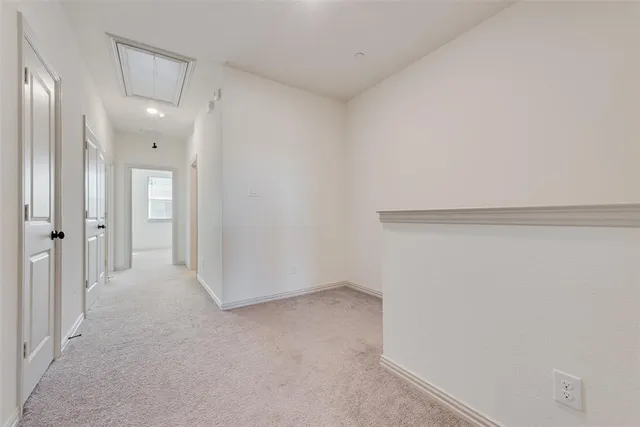 a en suite bathroom with a tub shower and window