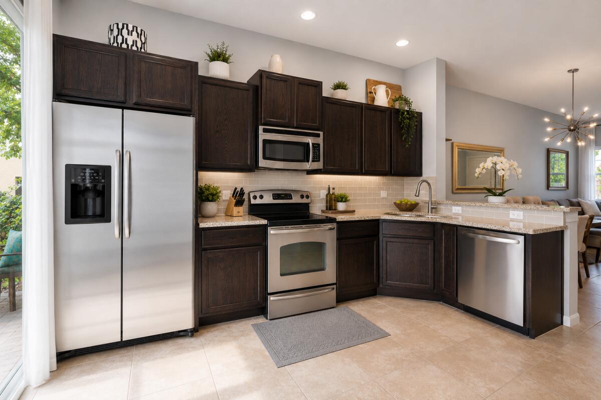 468 Francesca Ridge Road Boynton Beach, FL 33435 - Photo 5 of 11 a kitchen with stainless steel appliances granite countertop a refrigerator a stove a sink and a microwave
