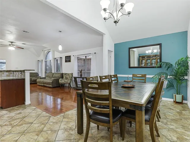 a view of a dining room with furniture
