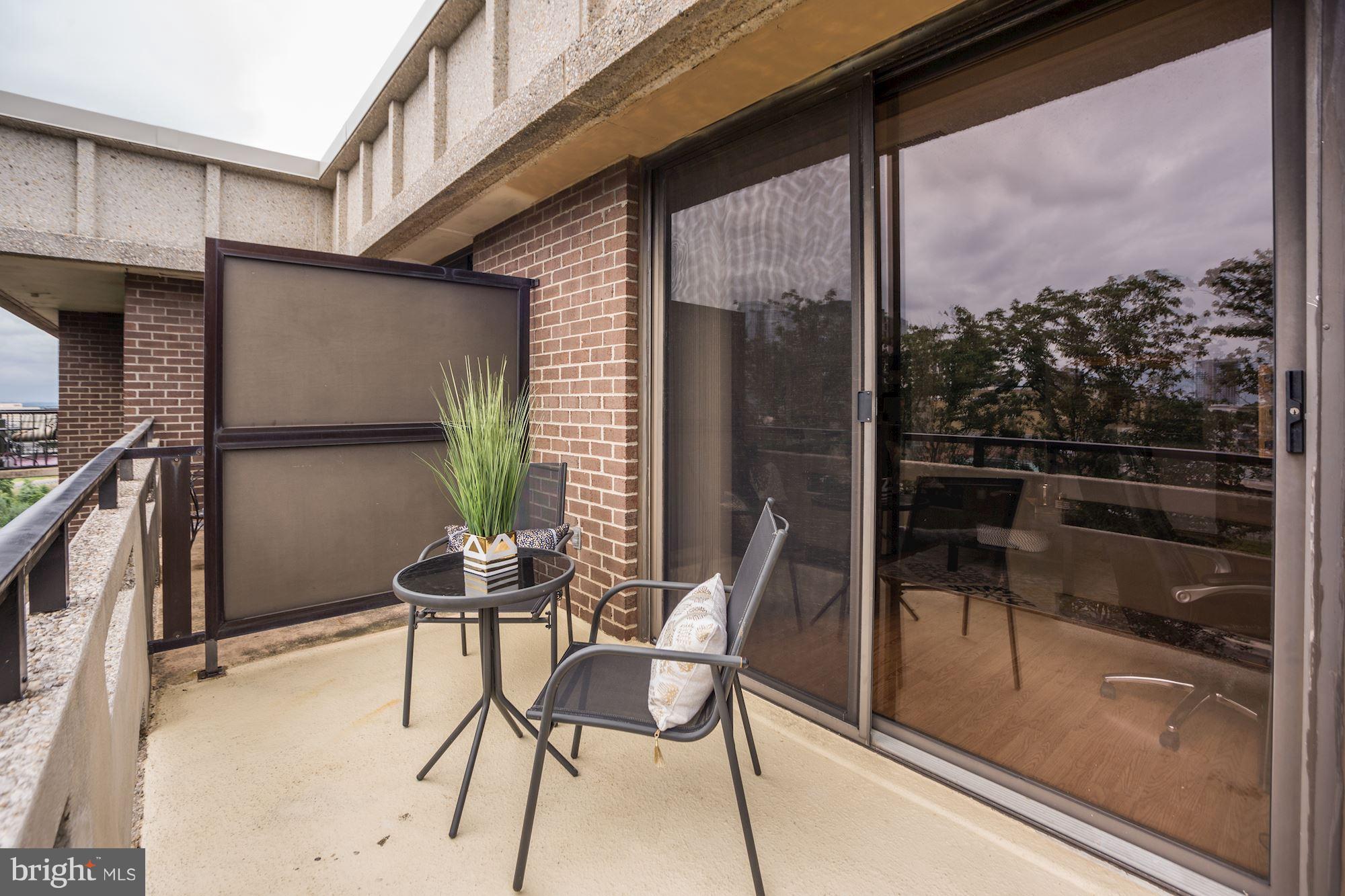 1808 Old Meadow Road, Unit 1403 McLean, VA 22102 - Photo 24 of 30 a view of balcony with chairs