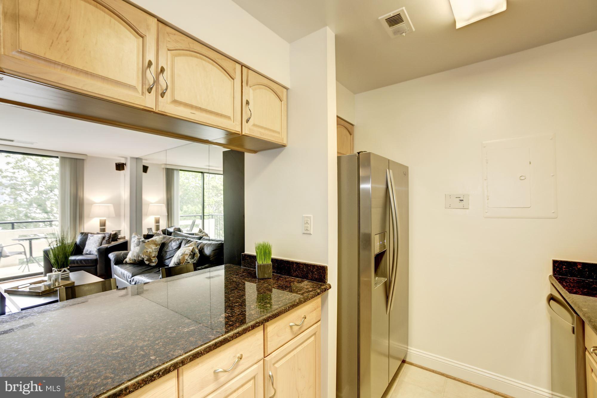 1808 Old Meadow Road, Unit 1403 McLean, VA 22102 - Photo 5 of 30 a very nice looking room with a large window