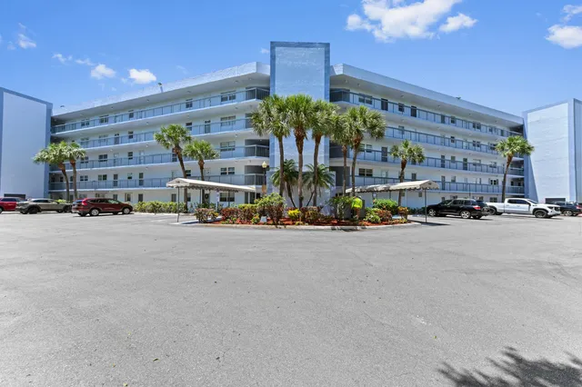 a front view of a building with street view