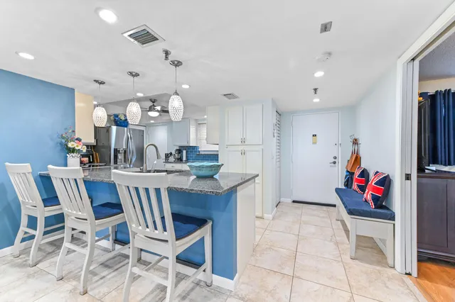 a dining room with furniture and a table