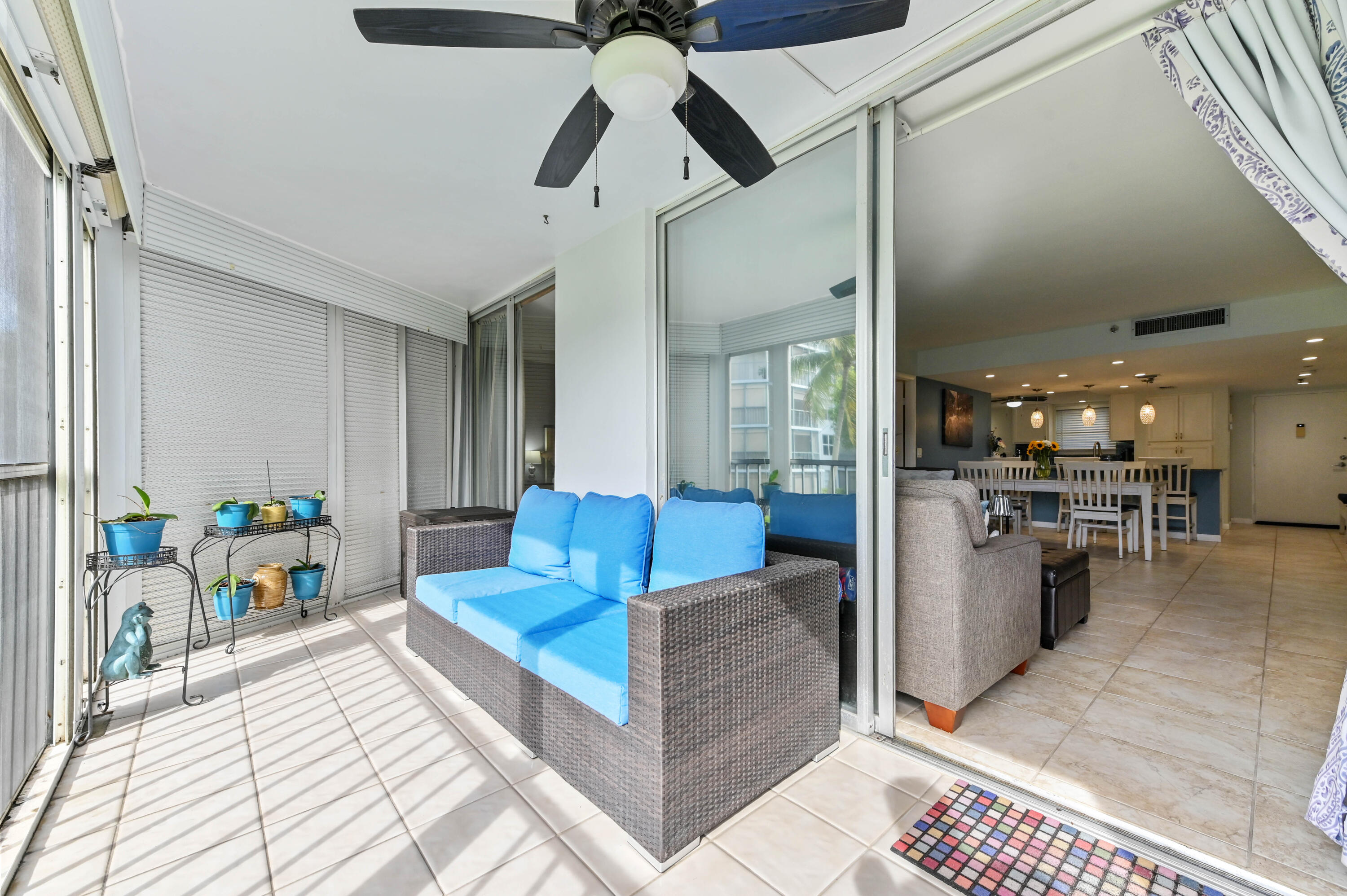 198 Northwest 67th Street, Unit 207 Boca Raton, FL 33487 - Photo 35 of 43 a living room with furniture and kitchen view