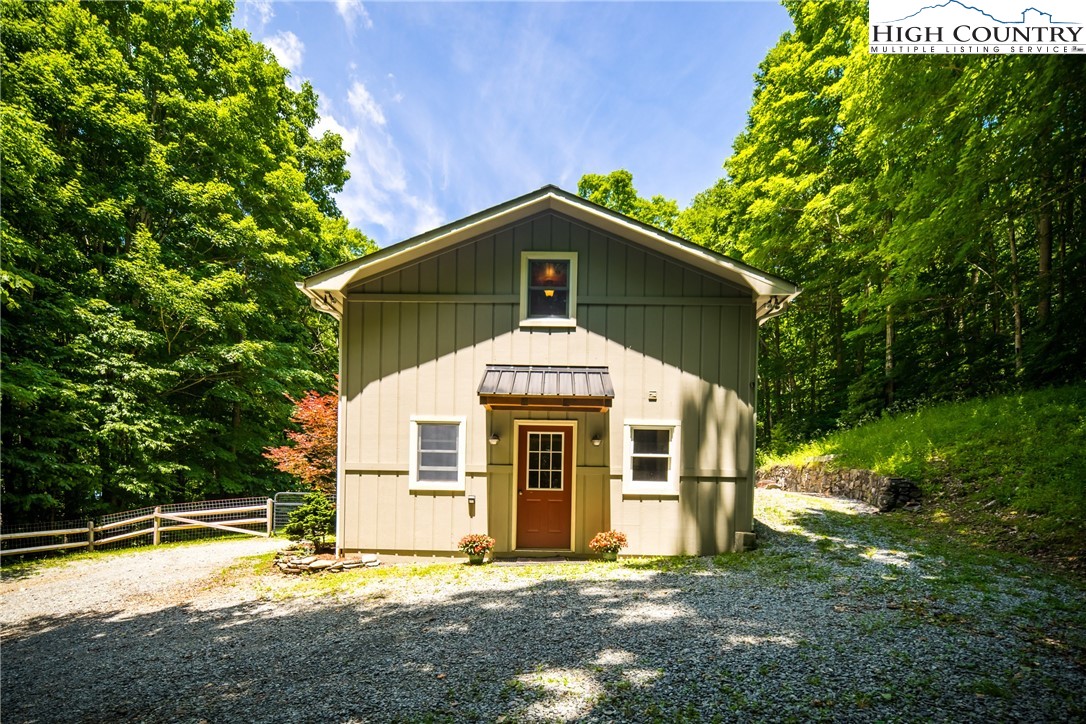 136 Hidden Circle Boone, NC 28607 - Photo 29 of 38 a front view of a house with a yard