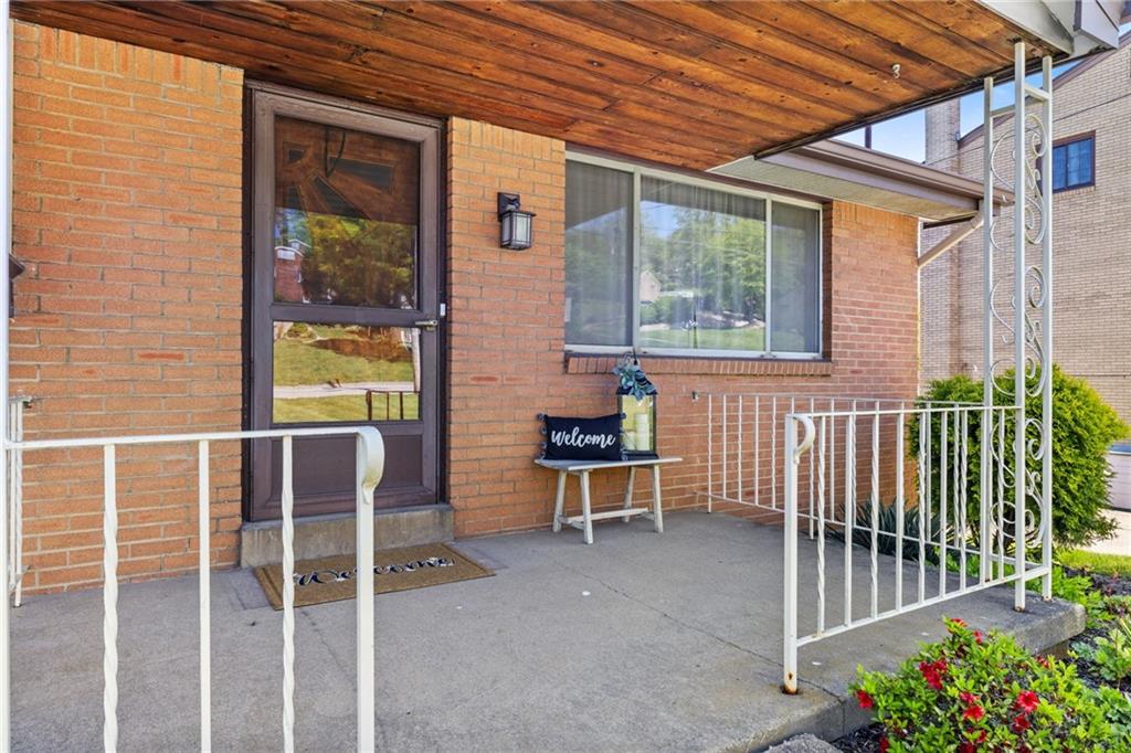 1317 Cathell Road Pittsburgh, PA 15236 - Photo 4 of 32 The welcoming covered front porch is the perfect spot for your morning coffee or tea.