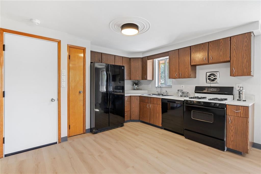 1317 Cathell Road Pittsburgh, PA 15236 - Photo 10 of 32 The new LVP flooring makes for an easy clean up.