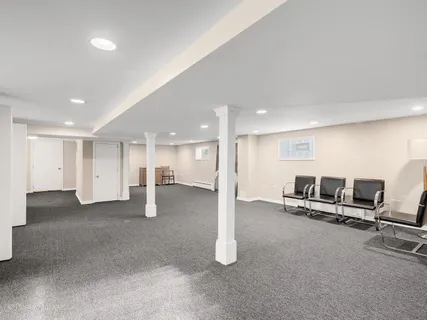 a view of a big room with gym equipment