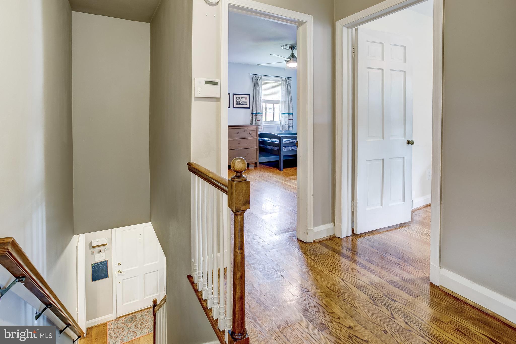 5501 Springlake Way Baltimore, MD 21212 - Photo 22 of 43 Hardwood floors continue to the second floor.