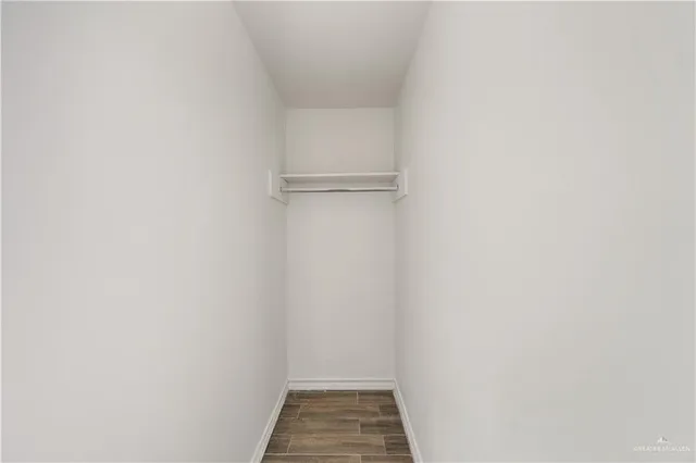 wooden floor in an empty room with wooden floor