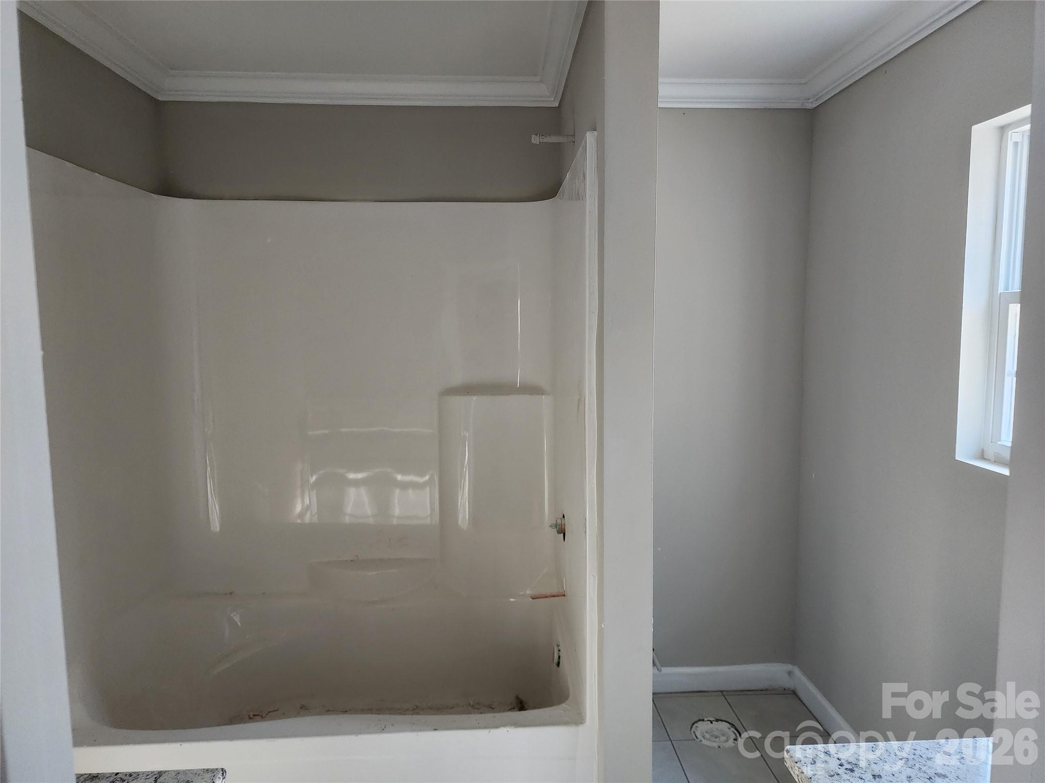 5405 Springs Road, Unit 3 Conover, NC 28613 - Photo 19 of 28 a bathroom with a glass shower door