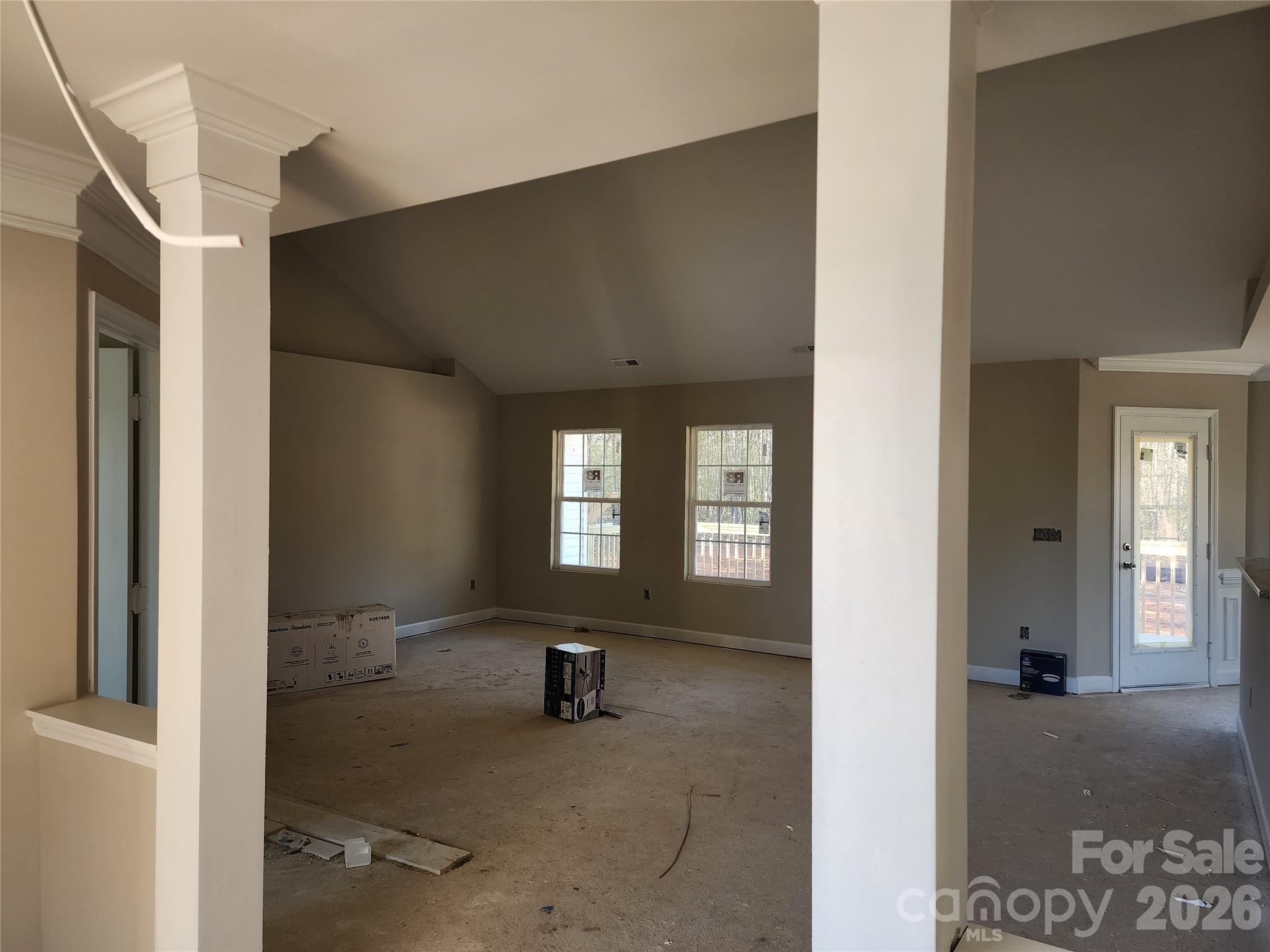 5405 Springs Road, Unit 3 Conover, NC 28613 - Photo 10 of 28 a view of an empty room with glass door and windows