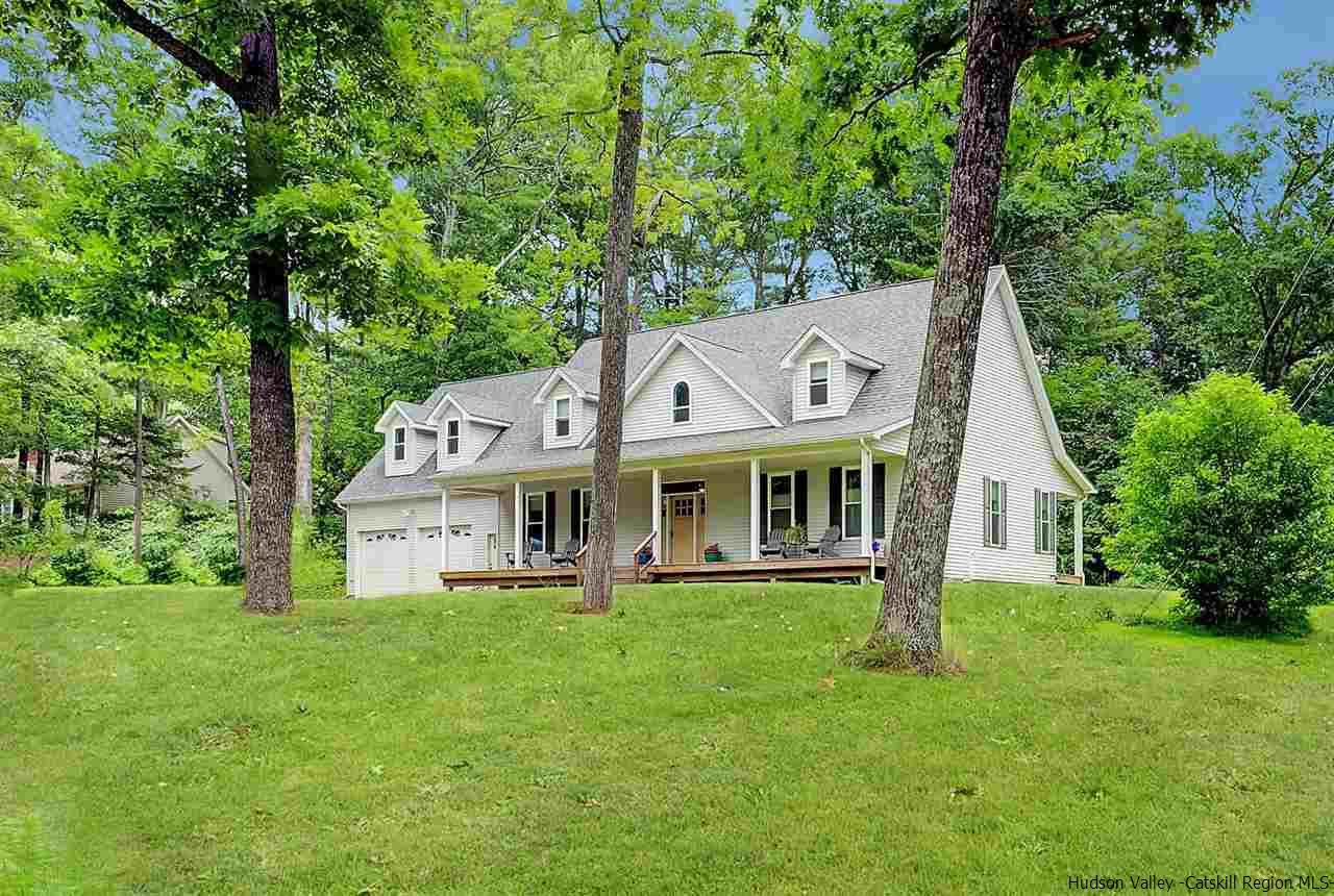 194 Harry Wells Road Saugerties, NY 12477 - Photo 1 of 35 a front view of a house with a yard