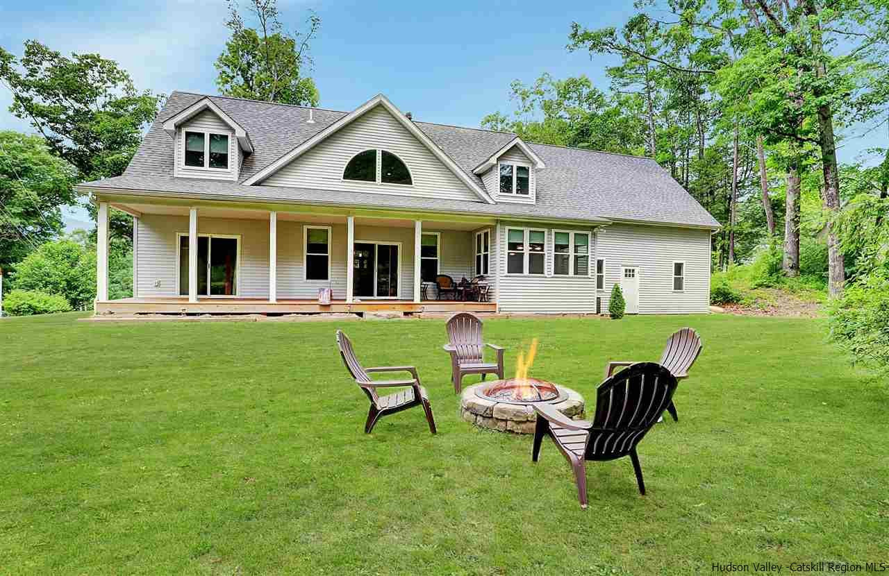194 Harry Wells Road Saugerties, NY 12477 - Photo 4 of 35 a view of a chairs in a patio