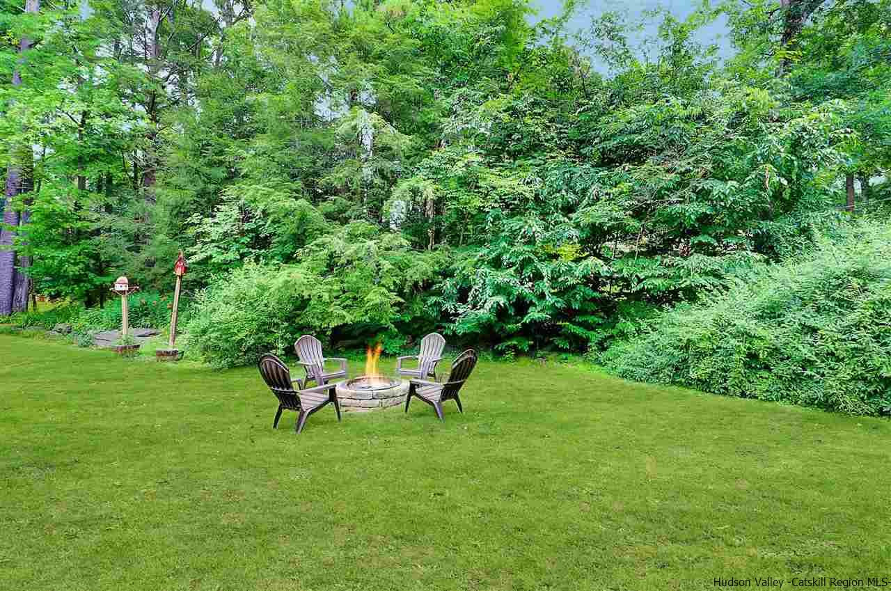 194 Harry Wells Road Saugerties, NY 12477 - Photo 7 of 35 a garden with a bench in garden