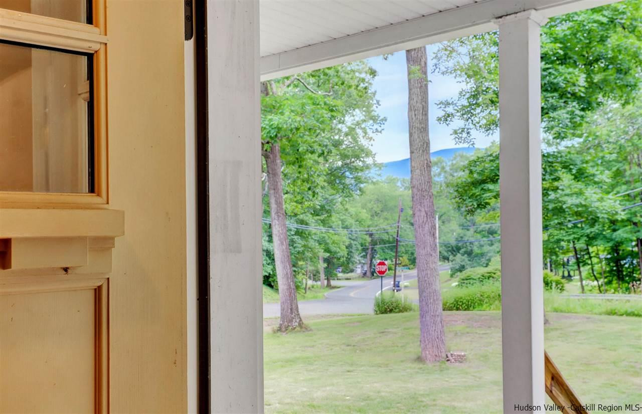 194 Harry Wells Road Saugerties, NY 12477 - Photo 10 of 35 a view of a porch with a yard