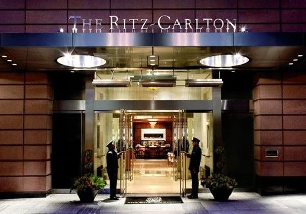 a kitchen with a refrigerator and a stove