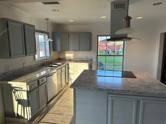 a view of room with hardwood floor