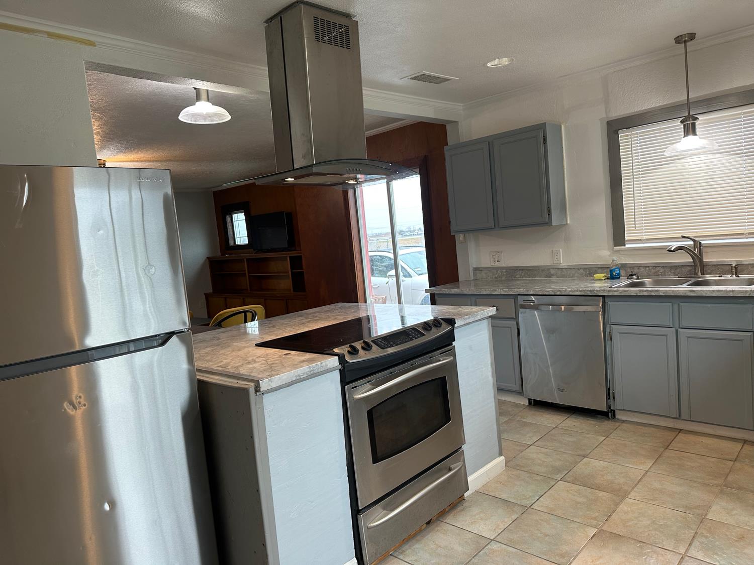 7271 Elk Grove Florin Road Sacramento, CA 95829 - Photo 18 of 49 a kitchen with a stove sink and refrigerator