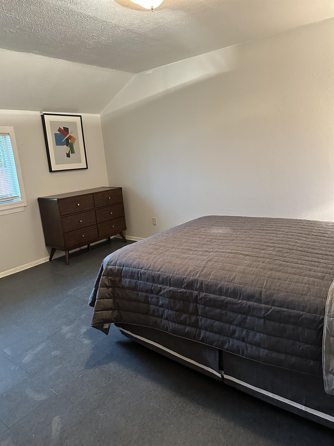 7271 Elk Grove Florin Road Sacramento, CA 95829 - Photo 30 of 49 a bedroom with a bed and wall painting