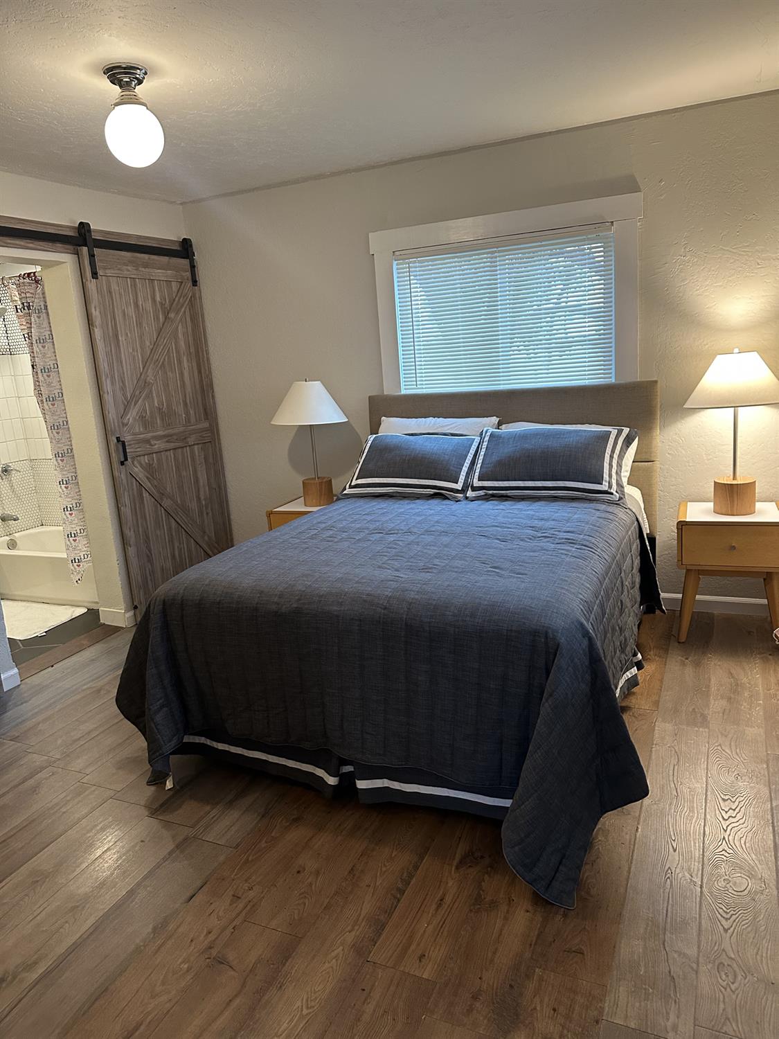 7271 Elk Grove Florin Road Sacramento, CA 95829 - Photo 33 of 49 a bedroom with a bed and a window