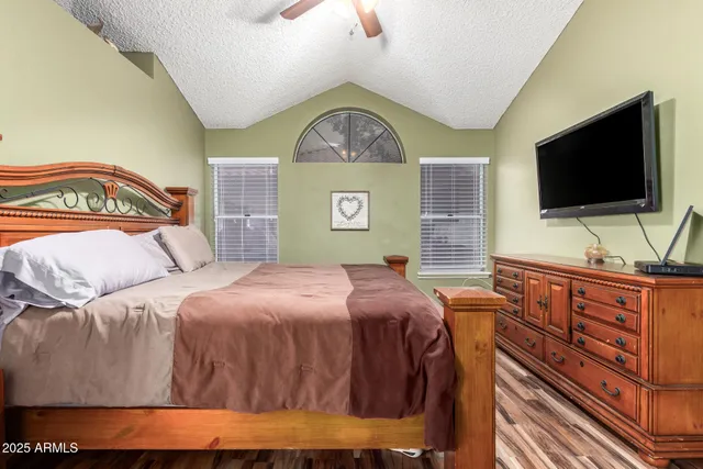 a large bathroom with a large tub and sink