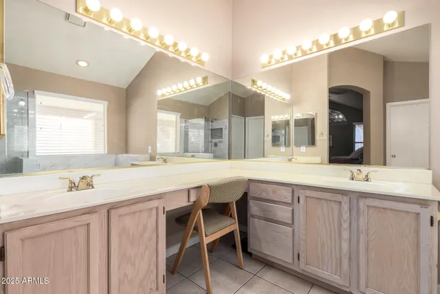 a room with furniture and large windows