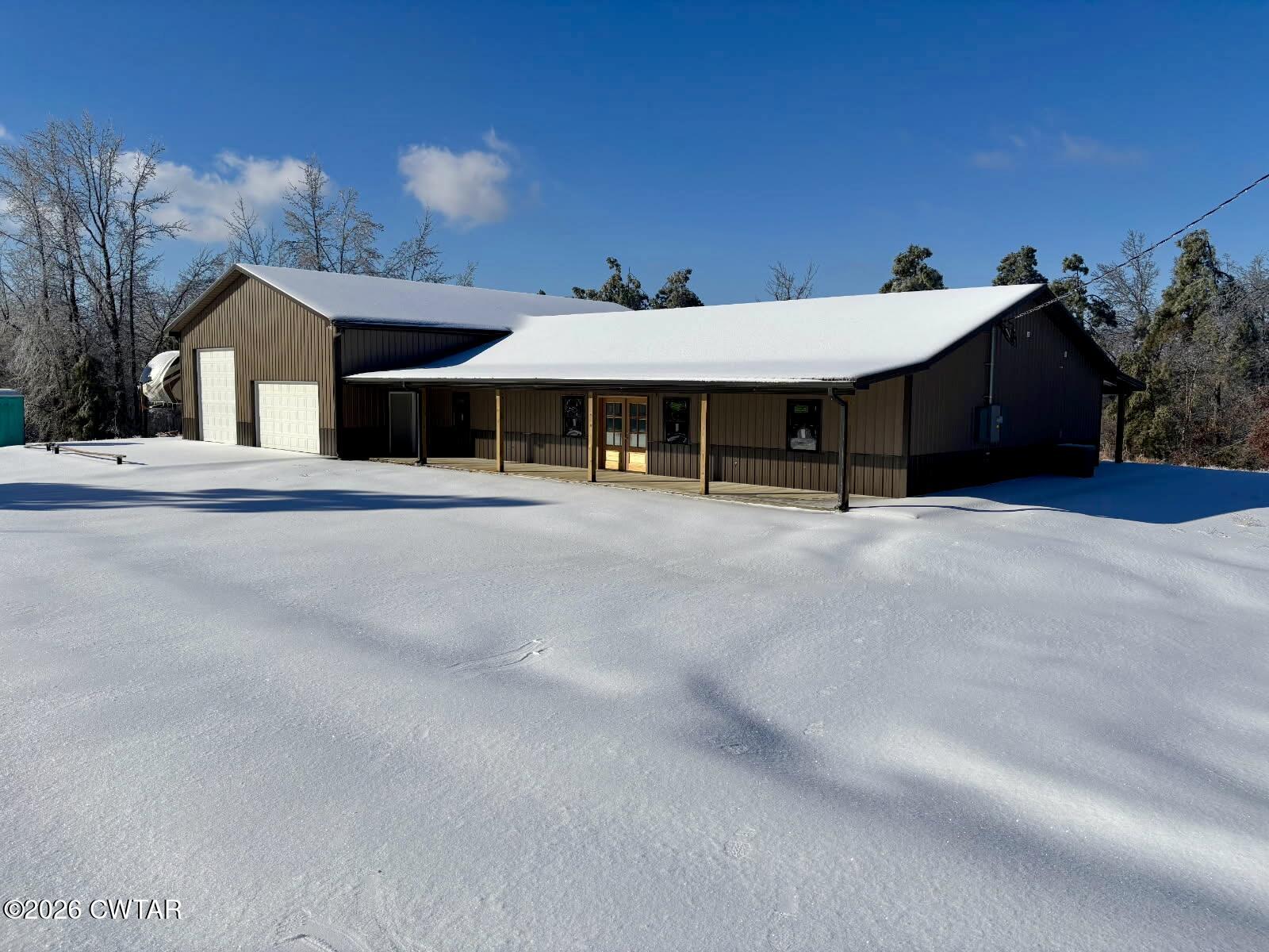 a view of a house with outdoor space and plants