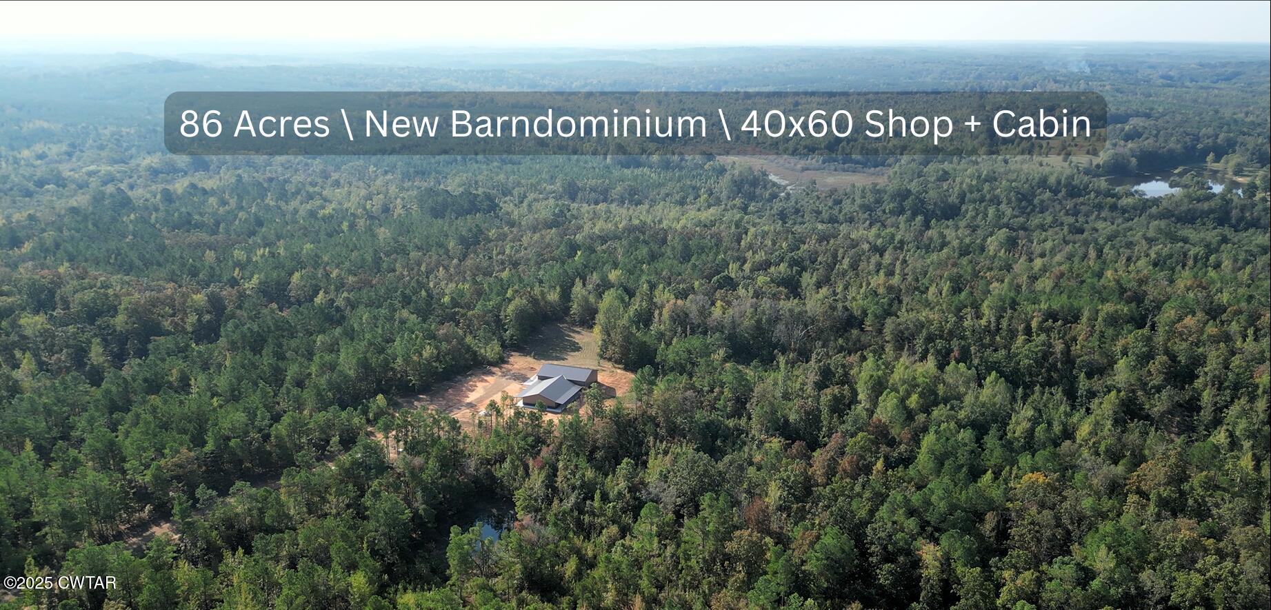 a sign that is sitting in the middle of a field