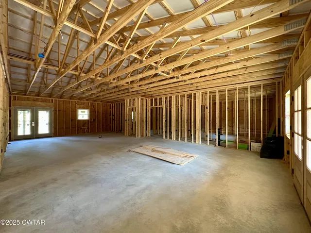 a view of a forest that has large trees