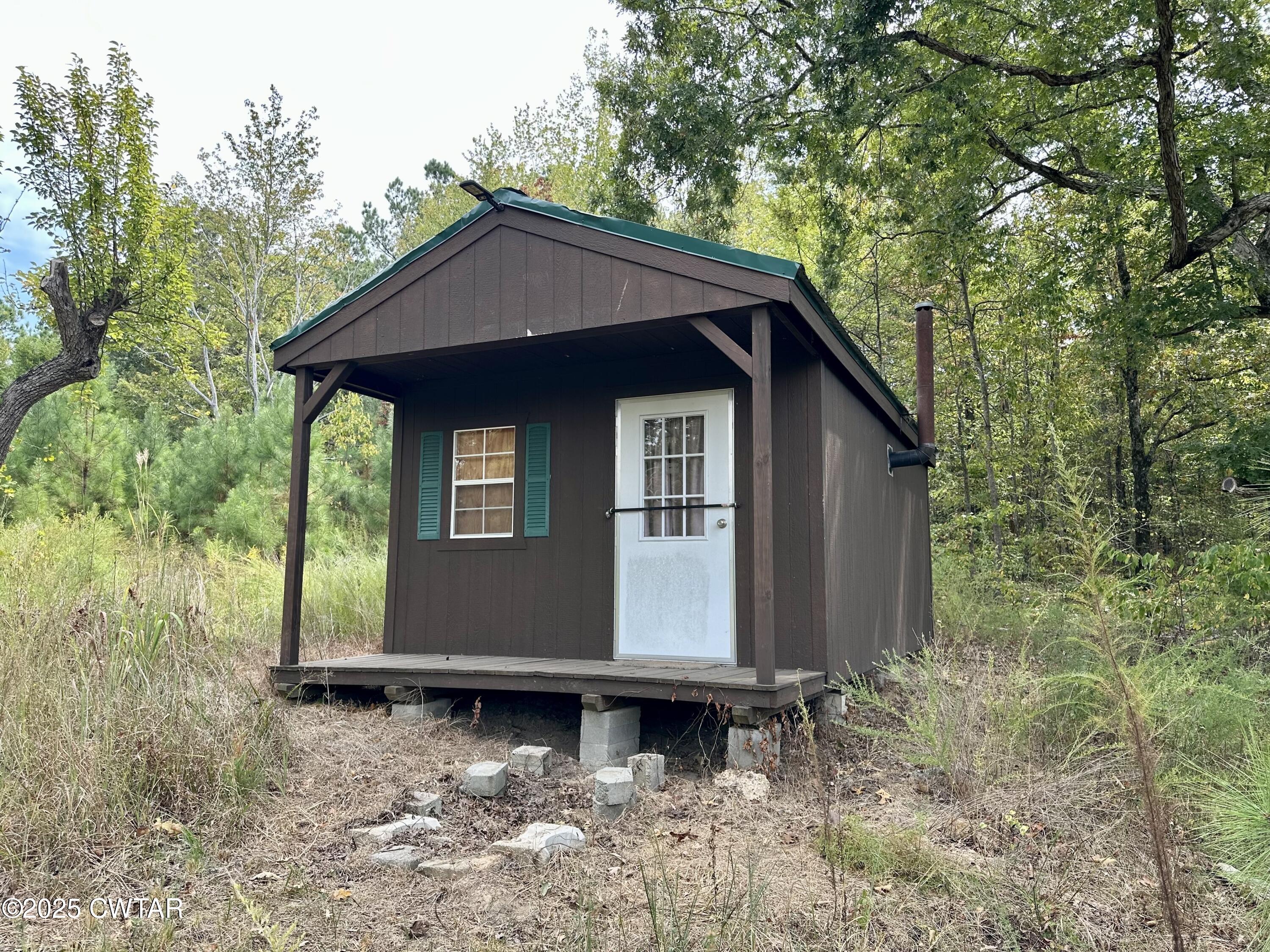 1137 Arl Bailey Road Finger, TN 38334 - Photo 33 of 40 a front view of house with yard