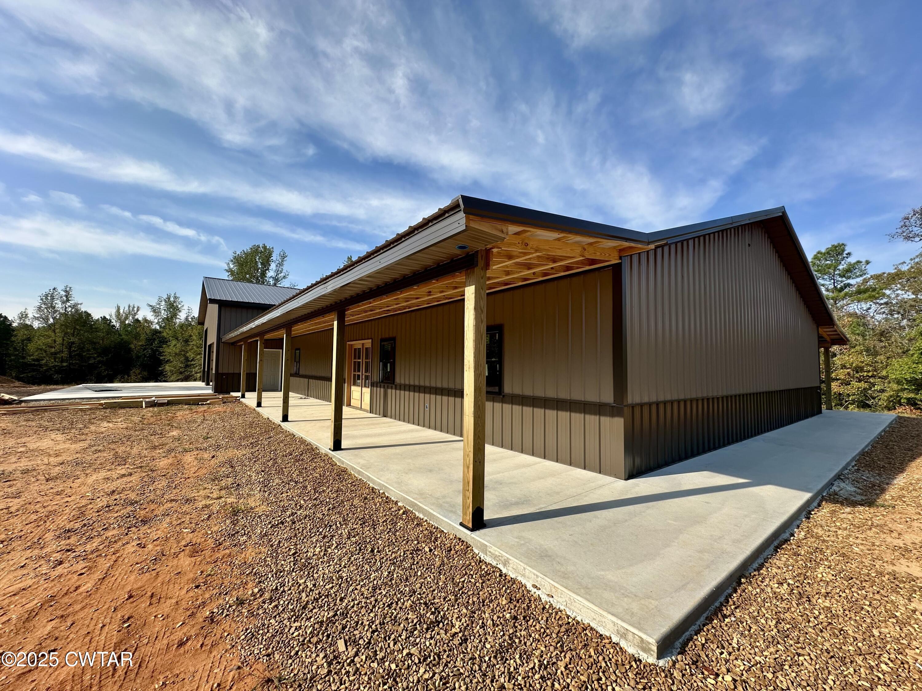 1137 Arl Bailey Road Finger, TN 38334 - Photo 7 of 40 a house view with a backyard space
