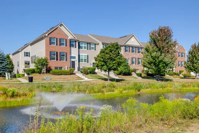 a front view of a house with swimming pool