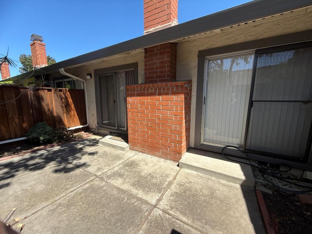 20072 Northcrest Square Cupertino, CA 95014 - Photo 17 of 26 a view of a house with backyard and porch