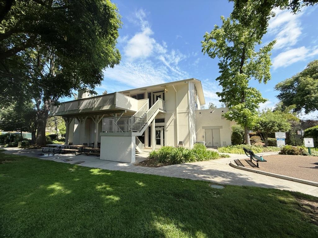 20072 Northcrest Square Cupertino, CA 95014 - Photo 23 of 26 a view of a house with backyard and sitting area