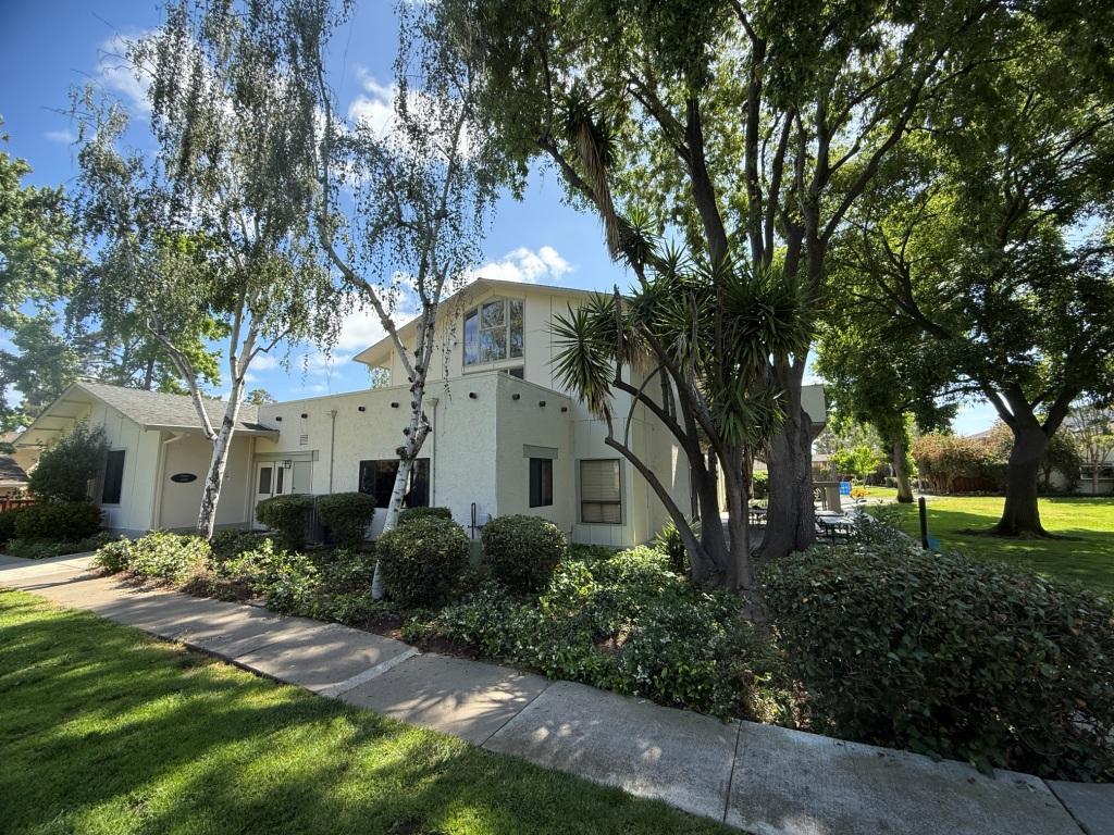 20072 Northcrest Square Cupertino, CA 95014 - Photo 24 of 26 a front view of a house with garden