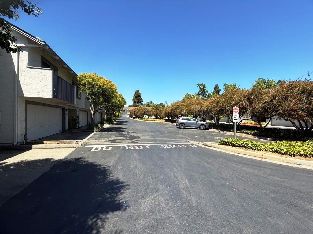 20072 Northcrest Square Cupertino, CA 95014 - Photo 25 of 26 a view of a street with houses on both side of it